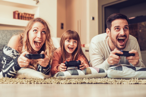 Loving family playing video game